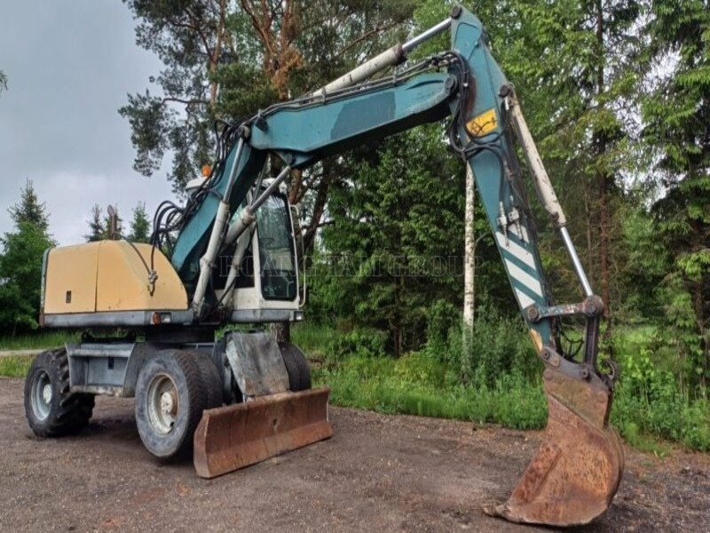 MÁY XÚC BÁNH LỐP VOLVO EW140 - ĐỜI 2002 - NHẬP KHẨU CHÂU ÂU