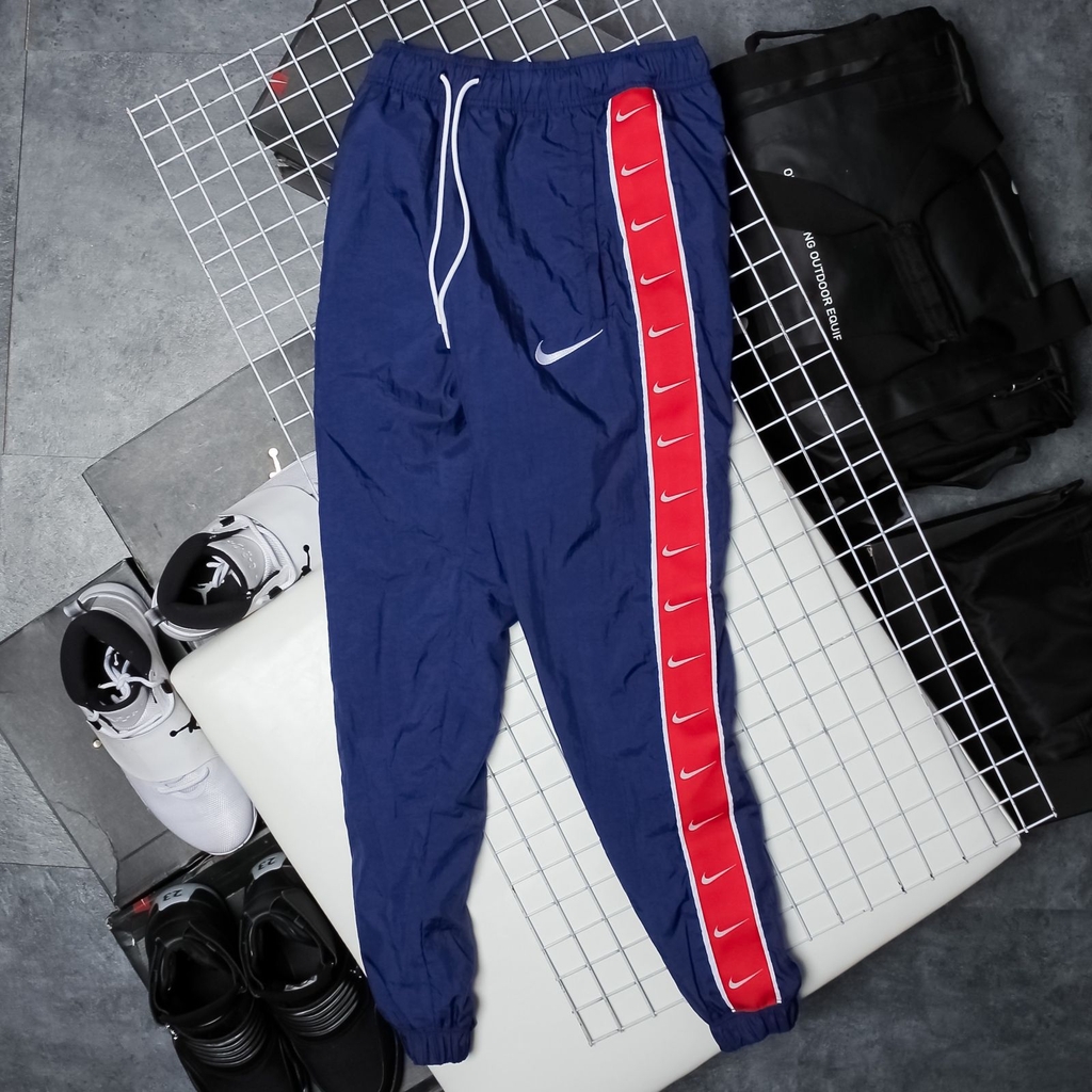 Quần Dài NK Taped Swoosh Popover Pants
