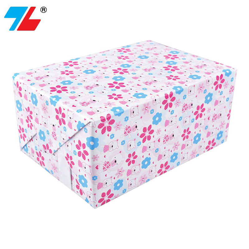 Giấy gói quà 70x50cm phủ bóng GGQ-003 - 4 họa tiết khác nhau