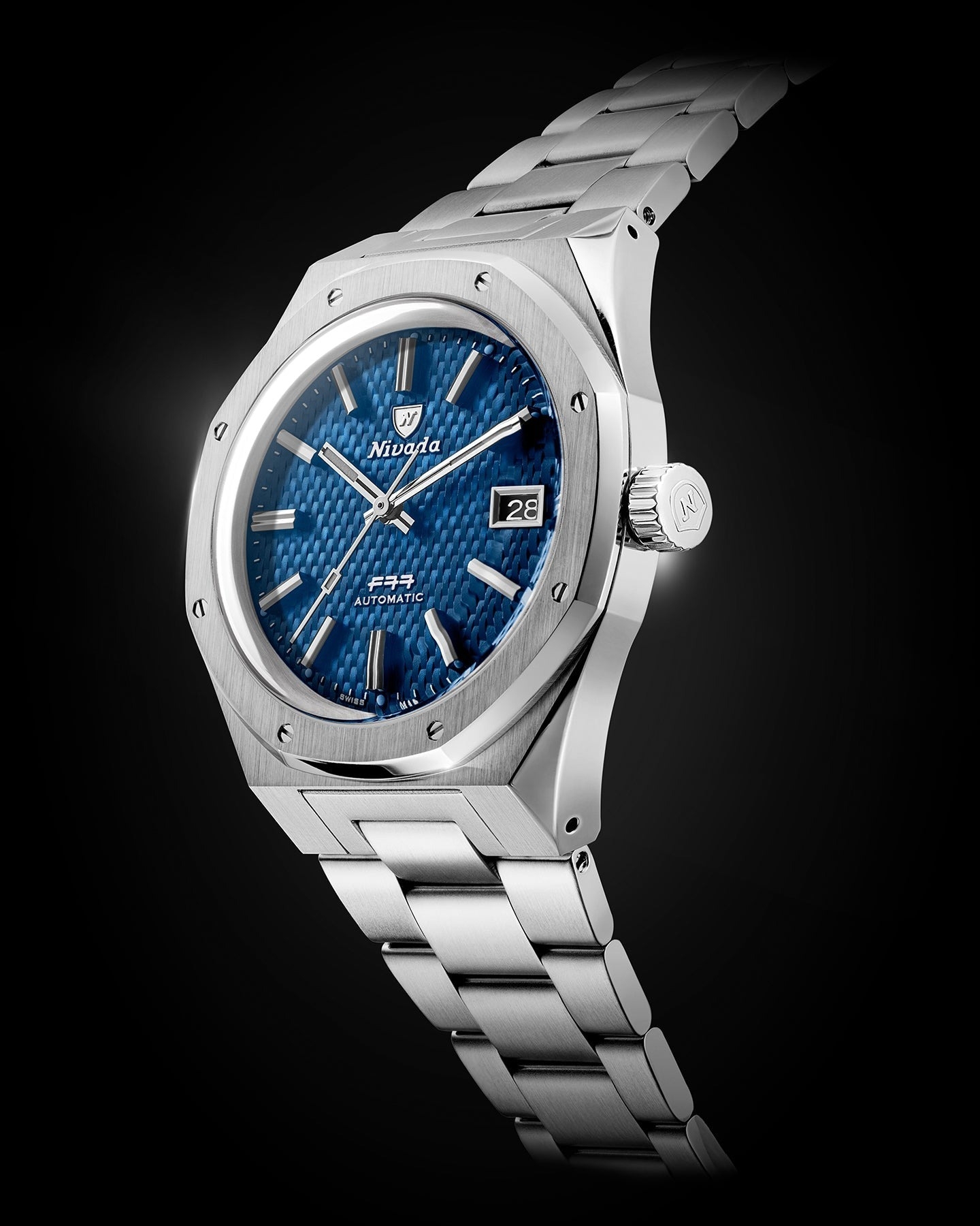 Nivada Grenchen, dòng sản phẩm F77, Ref number: 69041A77B, mặt số xanh họa tiết