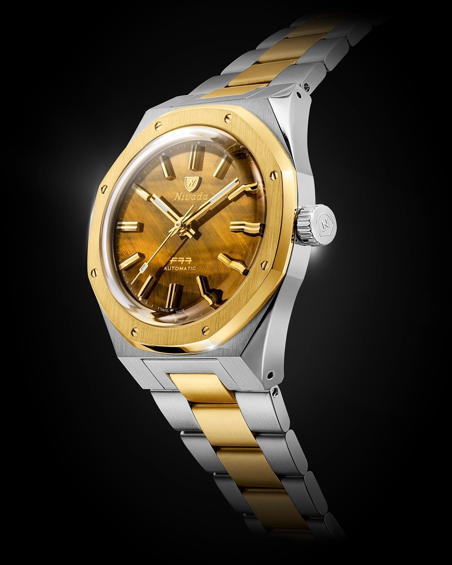 Nivada Grenchen, dòng sản phẩm F77, Ref number: 68033A77, mặt số Tiger Eye Bicolor Mark I