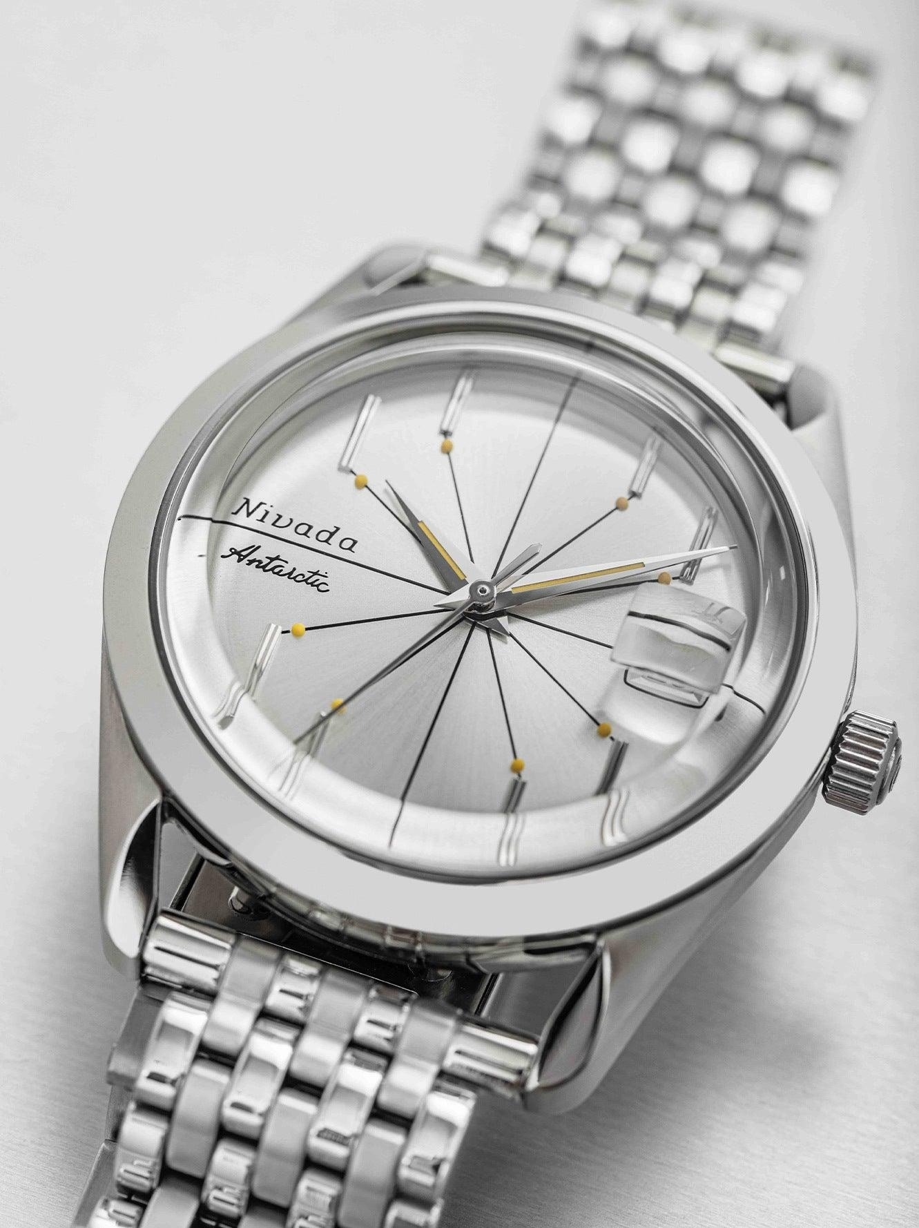 Nivada Grenchen Antarctic Spider Ref num 32023A mặt số Sunray chải bạc trắng