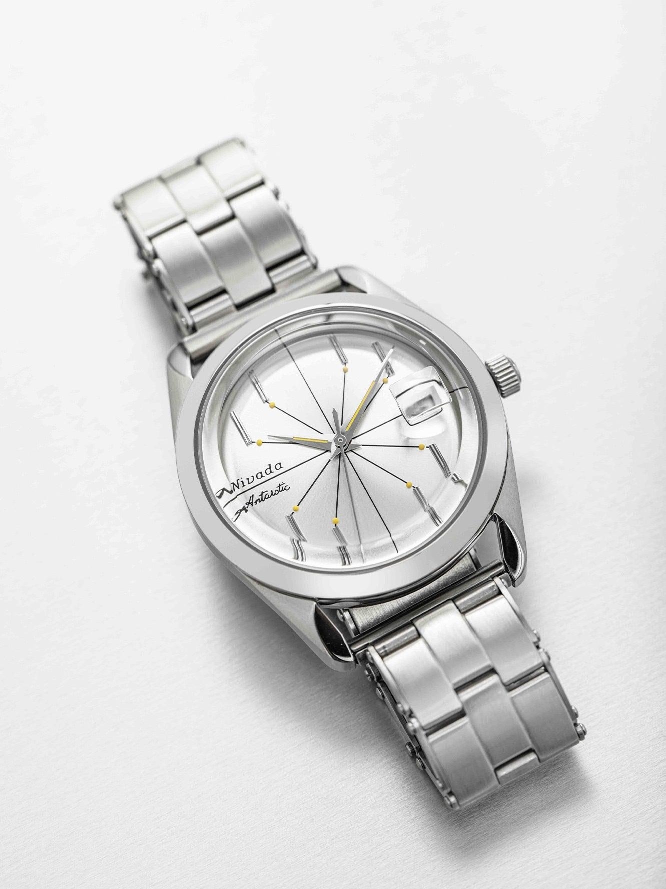 Nivada Grenchen Antarctic Spider Ref num 32023A mặt số Sunray chải bạc trắng