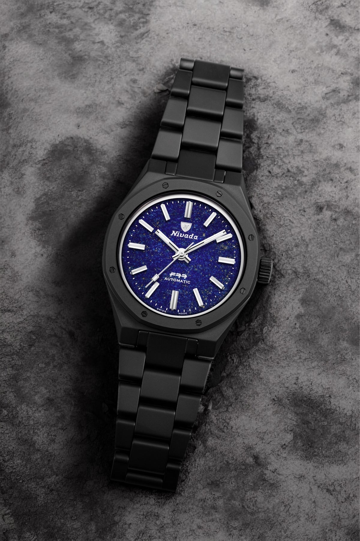 Nivada Grenchen, dòng sản phẩm F77, Ref number: 68022A77, mặt số Lapis Lazuli