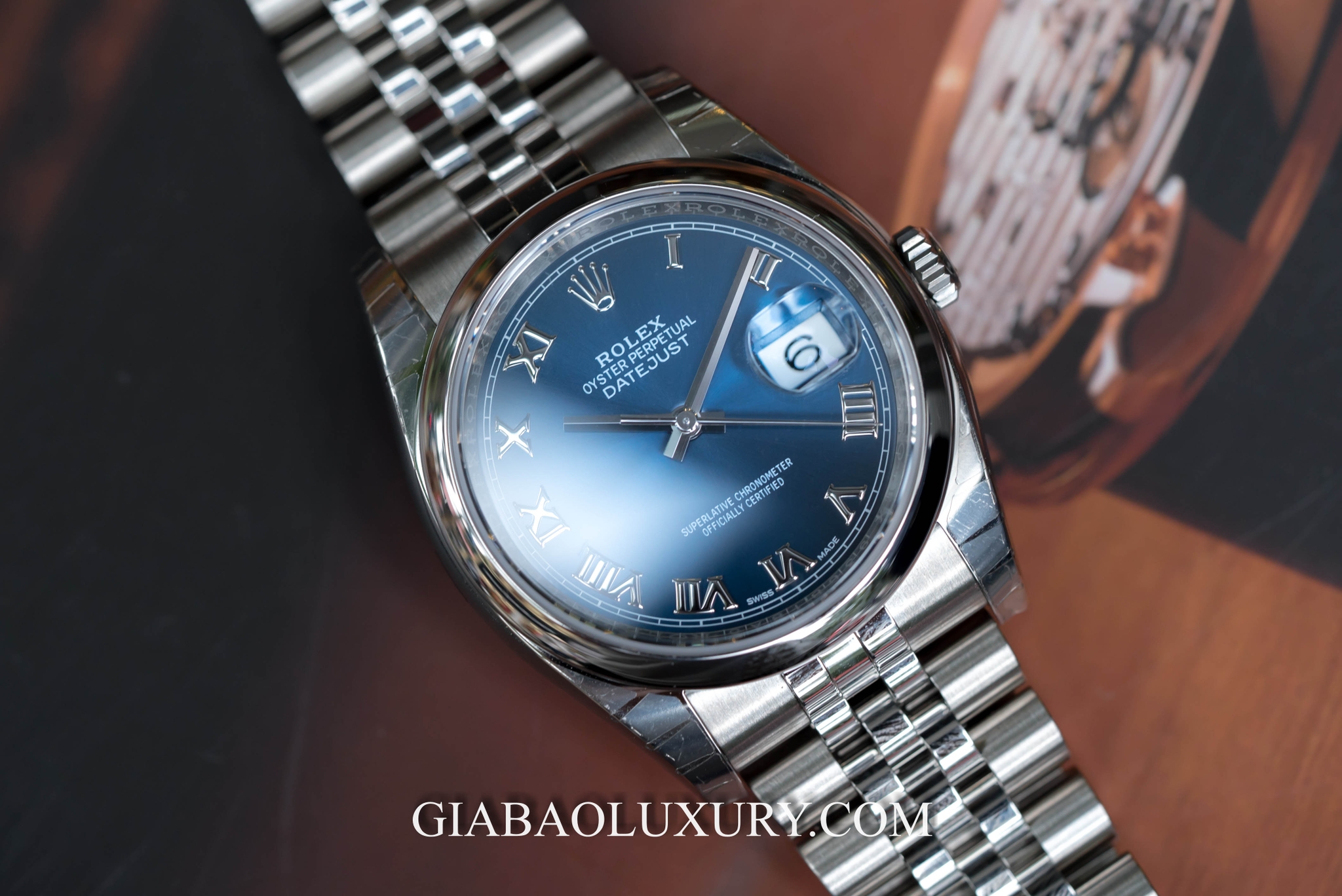 Đồng Hồ Rolex Datejust 116200 Mặt Số Xanh Cọc Số La Mã