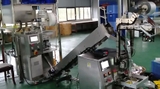 Máy đống gói trà túi lọc tam giác.