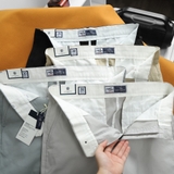 Quần short kaki Dusty Tailor kem vàng