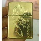 Zippo vàng bóng khắc sâu dragon