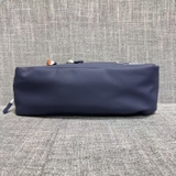 tui-dung-my-pham-mau-xanh-navy-hang-loreal