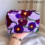 tui-dung-my-pham-tim-hoa-mau-hang-clinique-cho-nu