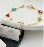 vong-tay-charm-bo-mix-hoa-mau-hang-kate-spade-xuat-cho-nu