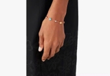 vong-tay-charm-bo-mix-hoa-mau-hang-kate-spade-xuat-cho-nu