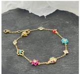 vong-tay-charm-bo-mix-hoa-mau-hang-kate-spade-xuat-cho-nu