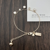 vong-tay-charm-nhi-kate-spade-xuat