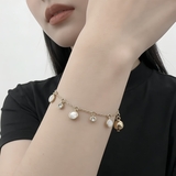 vong-tay-charm-nhi-kate-spade-xuat