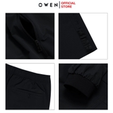 Bộ Thể Thao Nam Owen BTT256158 màu đen dáng reguler, áo cổ 3 phân, khóa kéo, tay và gấu bo chun, quần cạp chun ống suông chất liệu polyester