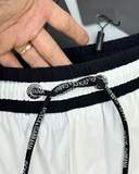 Quần short ngố đùi gió Dolce Gabbana logo check dọc 2 bên đùi thêu súng lục Like Auth 1-1 on web