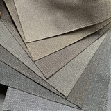 Rèm vải cao cấp tông ghi đậm kết hợp lớp voan trắng, mang đến vẻ đẹp hiện đại và sang trọng cho không gian phòng khách.