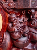 TƯỢNG DI LẶC ĐỨNG BAO TIỀN - GỖ NU TỬ ĐÀN