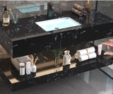 NT05 - Bàn đá 2 tầng đen vân mây kết hợp chậu sứ âm, vòi nóng lạnh và gương viền thép đen, kích thước 50x80cm.