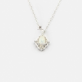 N OVAL FIRE SNOW AND MULTI TINY GEM