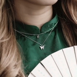 N DOUBLE LINE DOUBLE BUTTERFLY GEM