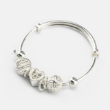 B BABY EXTENDABLE HEART BOW INSIDE AND CHIMING BALL
