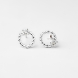 E STUD CIRCLE BRAIDED GEM