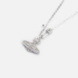 N SAFETY PIN DROP BIG CROSS