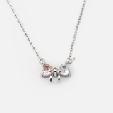 N PINK AND WHITE HEART GEM BOW