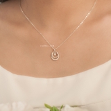 Dây chuyền bạc Việt Nam hai vòng tròn đá giữa