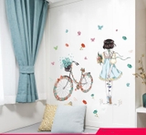Decal dán tường cô gái bên xe đạp dễ thương