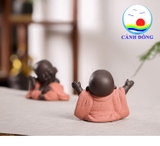 Tượng chú tiểu cười hoan hỷ dang tay đón hạnh phúc