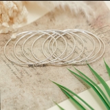 Vòng tay bạc nữ dạng vòng tuần bản mảnh hoạ tiết khắc phay chéo V2409160004