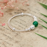 Vòng tay trẻ em charm mèo hello kitty, cầu bạc và charm cầu đá xanh lá cây V2409110035