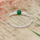 Vòng tay trẻ em charm mèo hello kitty, cầu bạc và charm cầu đá xanh lá cây V2409110035