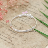 Vòng tay bé gái thiết kế charm nơ hồng xinh xắn V2409110026