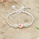 Vòng tay trẻ em charm cầu bạc và đá có chuông V2409110022