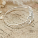 Vòng tay bạc nữ mặt vòng hình nơ tâm nơ là đường tròn đính đá bao quanh chữ LV V2409050046