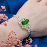 Vòng tay bạc nữ mặt vòng các hình thoi đan xen đính đá trung tâm đính đá xanh lá V2409050062