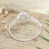 Vòng tay bạc nữ mặt vòng hình thoi đính đá chủ hình thoi và các cánh hoa đính đá bao quanh V2409050052