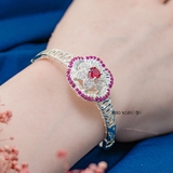Vòng tay bạc nữ mặt vòng hình hoa đính đá trắng bao quanh là đường tròn đá đỏ V2409050059