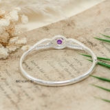 Vòng tay bạc nữ mặt vòng thiết kế hình lượn sóng đính đá trắng ôm lấy đá tròn lớn màu tím tương trưng cho sự thuỷ chung V2409040037