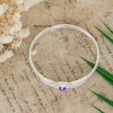 Vòng tay bạc nữ mặt vòng thiết kế hình lượn sóng đính đá trắng ôm lấy đá tròn lớn màu tím tương trưng cho sự thuỷ chung V2409040037