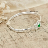 Vòng tay bạc nữ mặt vòng hình mặt trời tâm đính đá lớn màu xanh lá cây xung quang đính đá trắng V2409040032