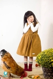 Váy nhung sát nách 3 khuy lệch vàng da bò