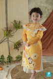 Áo dài gấm vàng họa tiết chim ADYEMVANG
