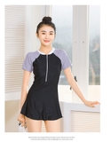 Bộ bơi bé gái cộc tay liền chân váy, đen tay tím nhạt