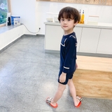 Bộ bơi dài tay màu đen, hình cún cam