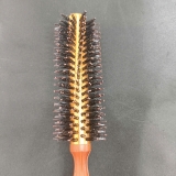 Lược cuốn tròn gỗ chuôi nhọn bọc nhuôm